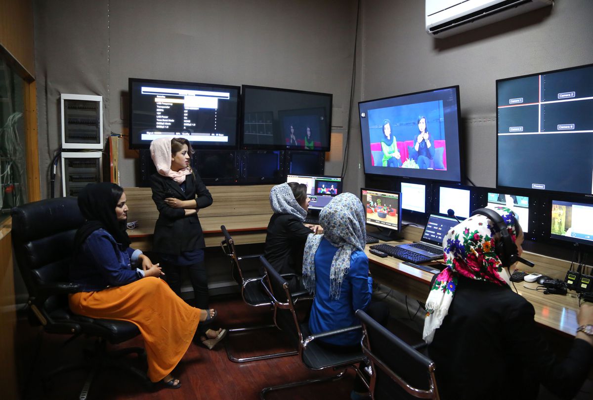 producers sit in editing room of zan tv station in kabul afghanistan epa